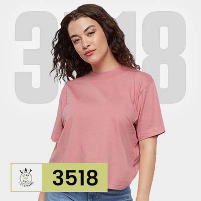 Model wearing LAT 3518 women's boxy t-shirt in rose pink color