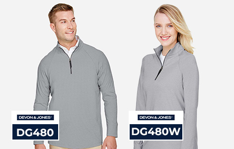 A man and a woman wearing grey Devon & Jones DG480 and DG480W CrownLux performance quarter-zip pullovers, designed with moisture-wicking, UV protection, and spandex comfort, ideal for wholesale athletic and corporate apparel.
