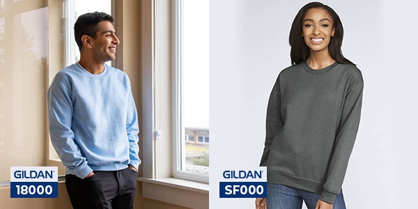 Side-by-side comparison of Gildan 18000 Heavy Blend crewneck sweatshirt and Gildan SF000 Softstyle crewneck sweatshirt worn by male and female models, highlighting fit and fabric differences
