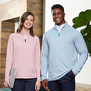 men and women wearing quarter zip pullovers performance apparel for corporate uniforms
