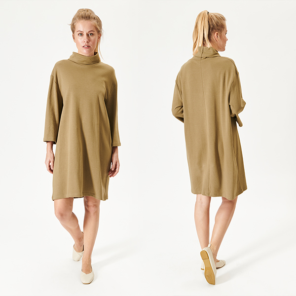 woman wearing loose fit turtleneck sweater dress casual minimalist outfit front and back view